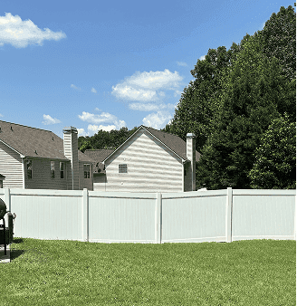 White vinyl fence installation